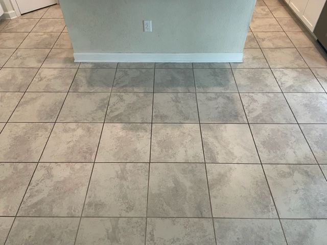 gray limestone tile and grout cleaning