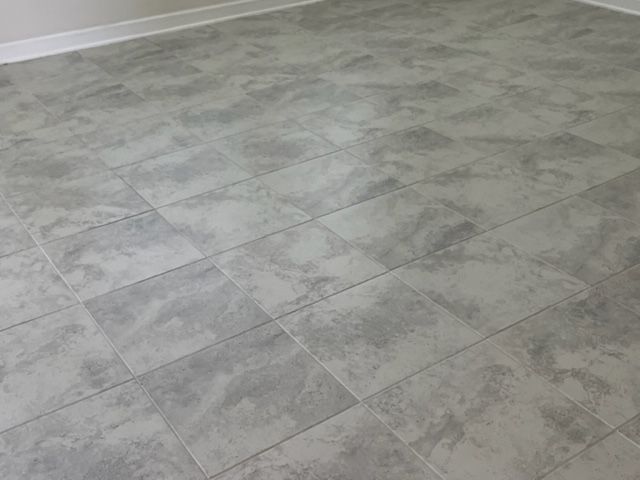 tile grout gray stained