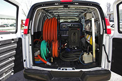 van with tile and grout cleaning equipment