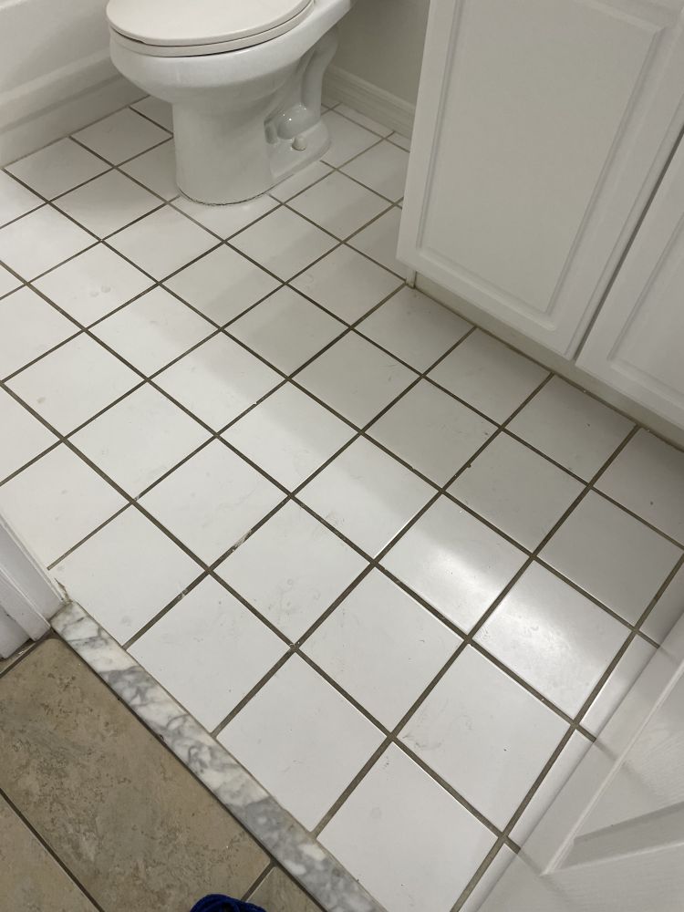 white bathroom tile grout